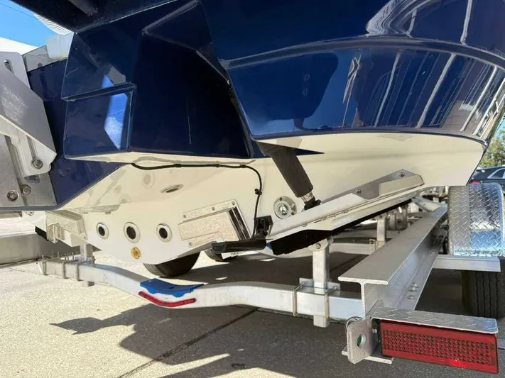 Black Label Marine Yacht Photos Pics Caymas 28 HB 2026 boat hull on trailer, close-up view.