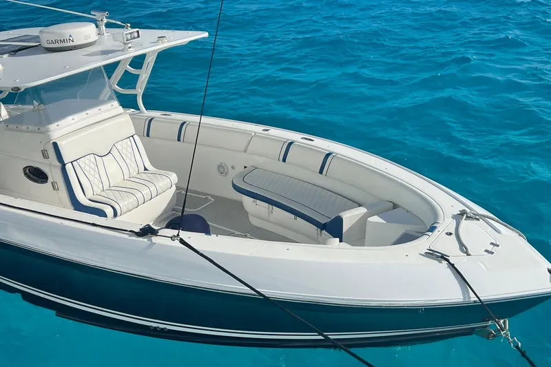 N/a Yacht Photos Pics 2014 Midnight Express 37 EXK boat on clear blue water.