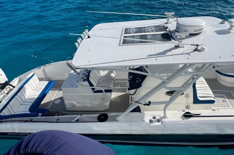 N/a Yacht Photos Pics 2014 Midnight Express 37 EXK boat on clear blue water, featuring sleek design and modern equipment.