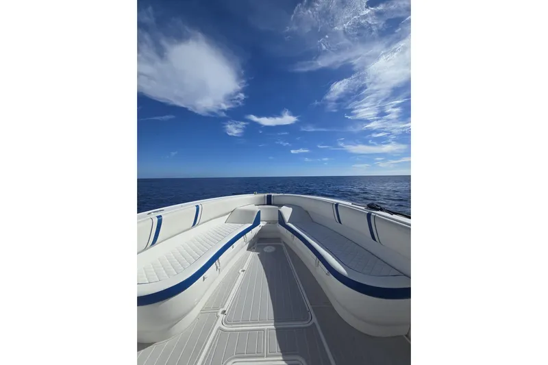 N/a Yacht Photos Pics 2014 Midnight Express 37 EXK boat on open sea under clear blue sky.