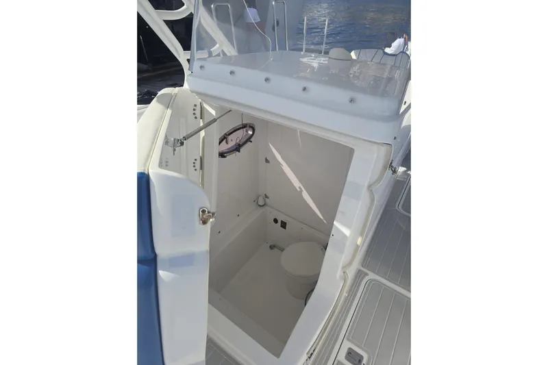 N/a Yacht Photos Pics 2014 Midnight Express 37 EXK boat interior with open cabin door and visible toilet.