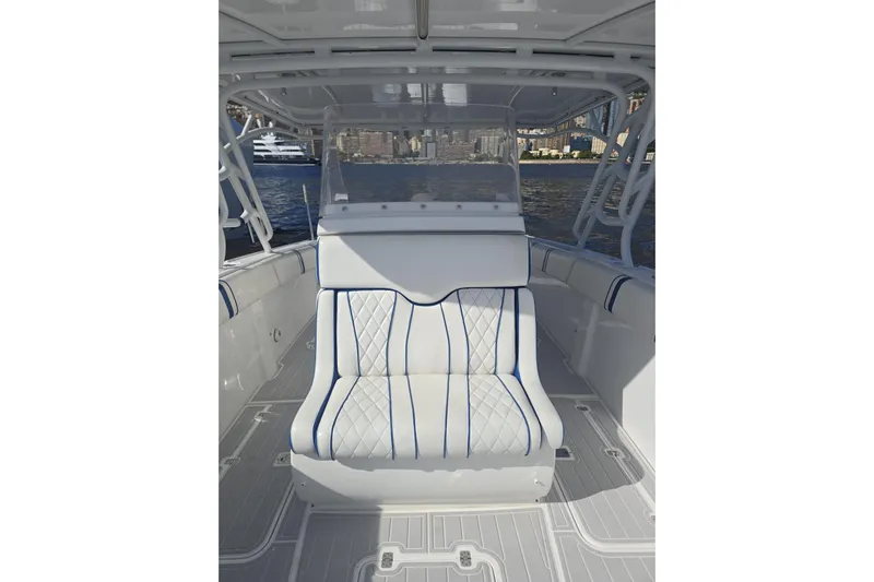 N/a Yacht Photos Pics Interior of 2014 Midnight Express 37 EXK boat with white and blue seating.