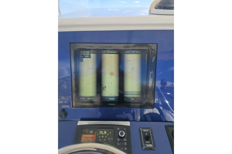 N/a Yacht Photos Pics Dashboard of a 2014 Midnight Express 37 EXK boat with navigation display.