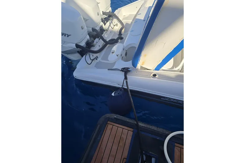 N/a Yacht Photos Pics 2014 Midnight Express 37 EXK boat with Mercury engines docked on water.