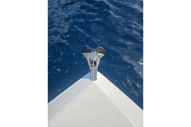 N/a Yacht Photos Pics Bow of 2014 Midnight Express 37 EXK boat on clear blue water.