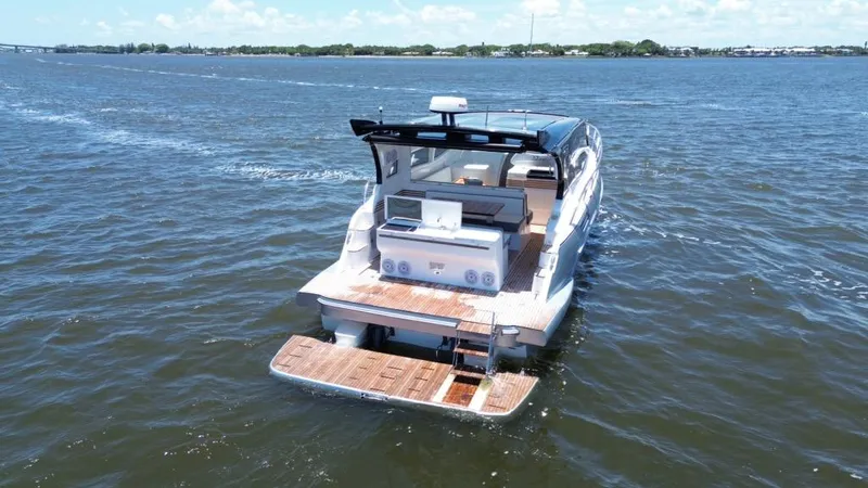  Yacht Photos Pics Luxury yacht "Real 40 HT" cruising on open water, 2025 model.