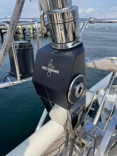 Disco Lemonade Yacht Photos Pics Reckmann sailboat equipment on 1992 Nautor Swan 68, docked by the sea.