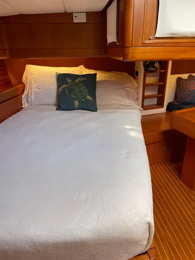 Disco Lemonade Yacht Photos Pics Cozy bedroom in a 1992 Nautor Swan 68 yacht with wooden interiors.