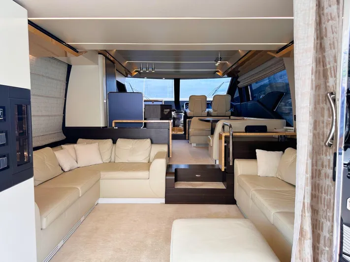 Tamara II Yacht Photos Pics Luxurious interior of 2018 Azimut 66 FLY yacht with beige seating and modern design.