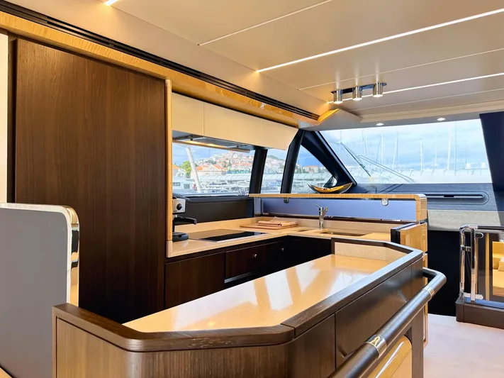 Tamara II Yacht Photos Pics Luxurious interior of 2018 Azimut 66 FLY yacht with modern kitchen design.