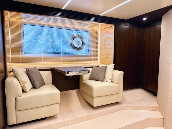 Tamara II Yacht Photos Pics Luxurious interior of 2018 Azimut 66 FLY yacht with elegant seating and modern decor.