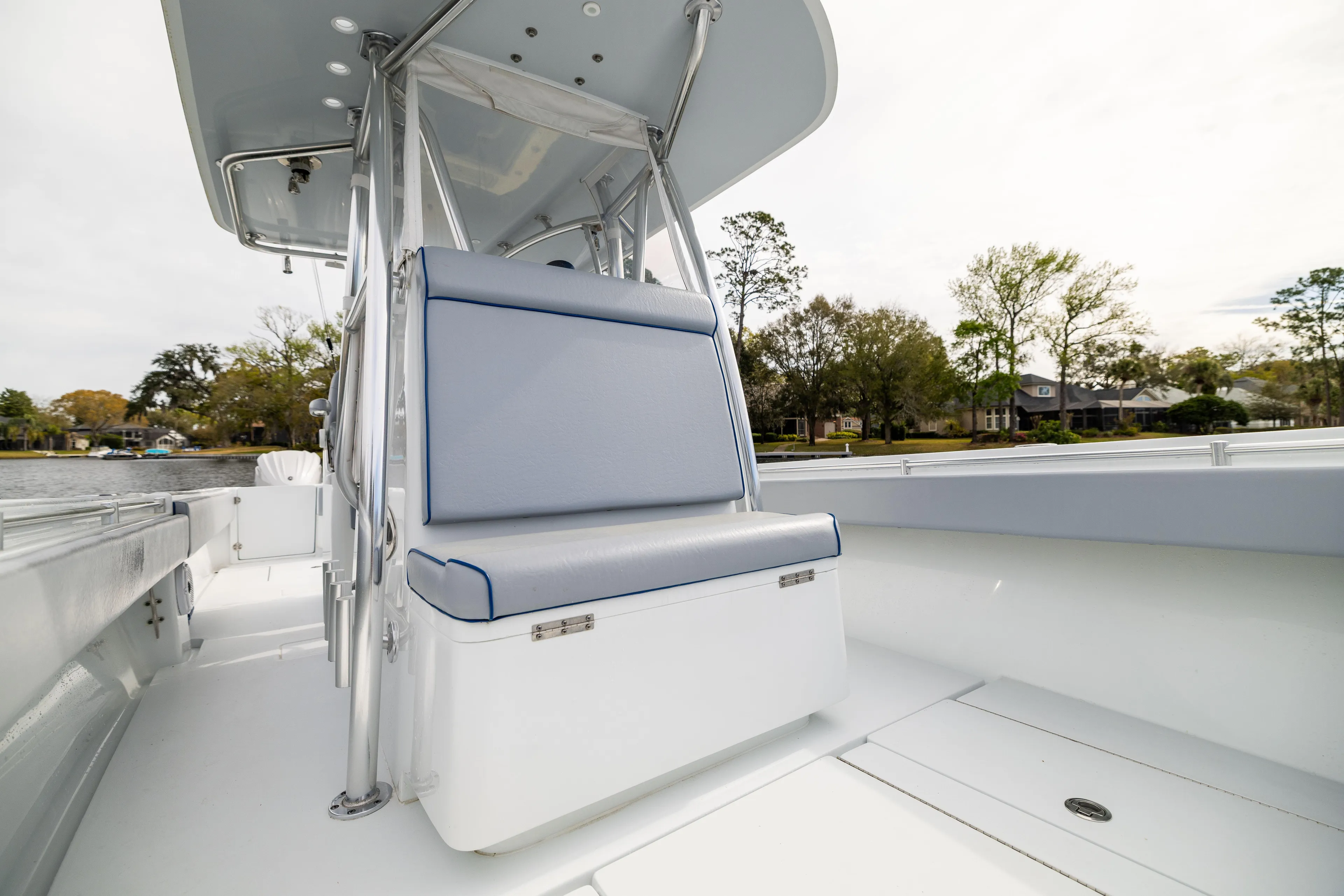  Yacht Photos Pics 2022 Contender 35ST boat interior with cushioned seating and sleek design.