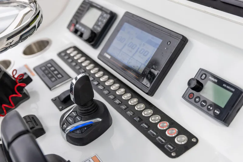  Yacht Photos Pics Control panel of 2022 Contender 35ST boat with advanced navigation and control systems.