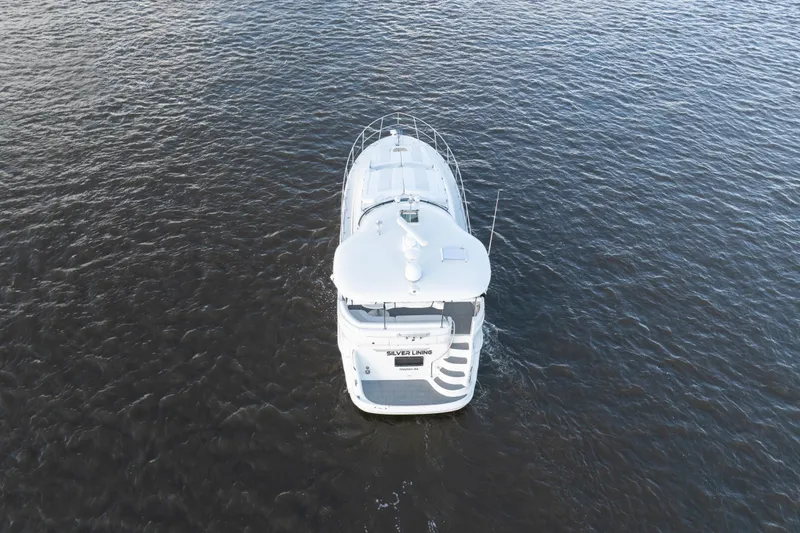  Yacht Photos Pics Aerial view of 2007 Sea Ray 40 Motor Yacht cruising on open water.