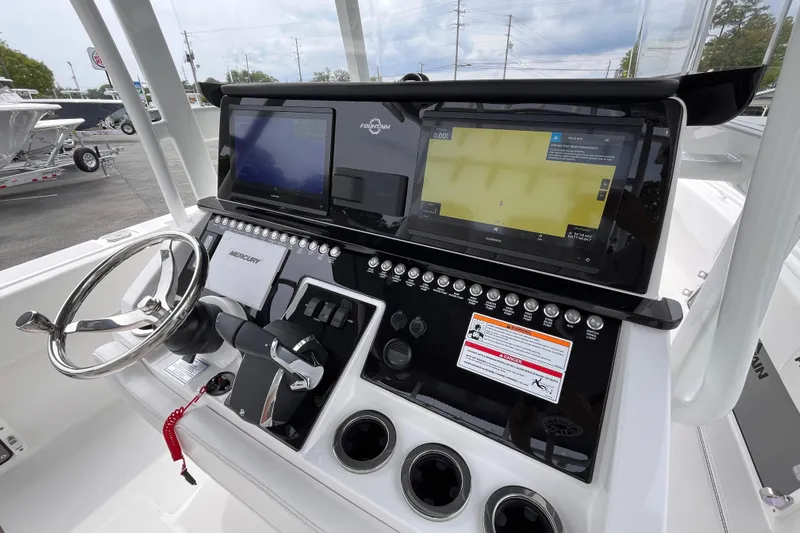  Yacht Photos Pics 2025 Fountain 34 Tournament Edition boat dashboard with advanced navigation and control systems.