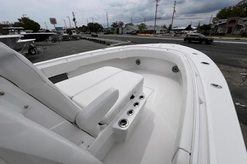  Yacht Photos Pics 2025 Fountain 34 Tournament Edition boat with sleek white seating and modern design.