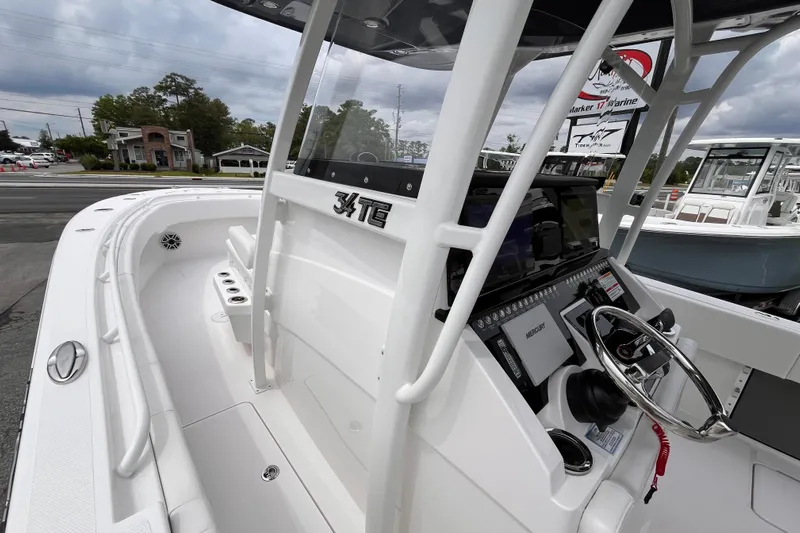  Yacht Photos Pics 2025 Fountain 34 Tournament Edition boat, sleek design, modern dashboard, and spacious deck.