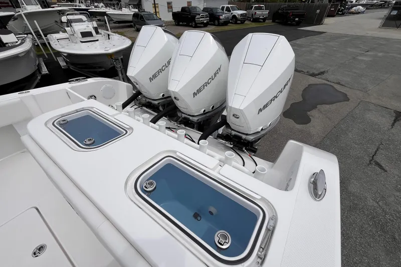  Yacht Photos Pics 2025 Fountain 34 Tournament Edition boat with triple Mercury outboard engines.