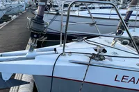 Sailboat Allures 45, 2012 model, docked with visible anchor and rigging.