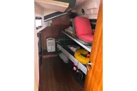 Interior of 2012 Allures 45 sailboat with storage and seating area.