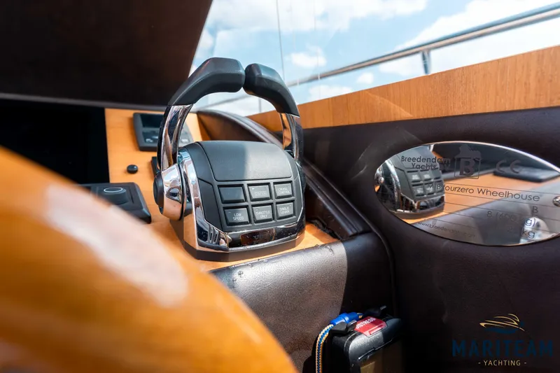 Onderonsie Yacht Photos Pics 2017 Breedendam MTB fourzero Wheelhouse interior with modern controls and wooden accents.