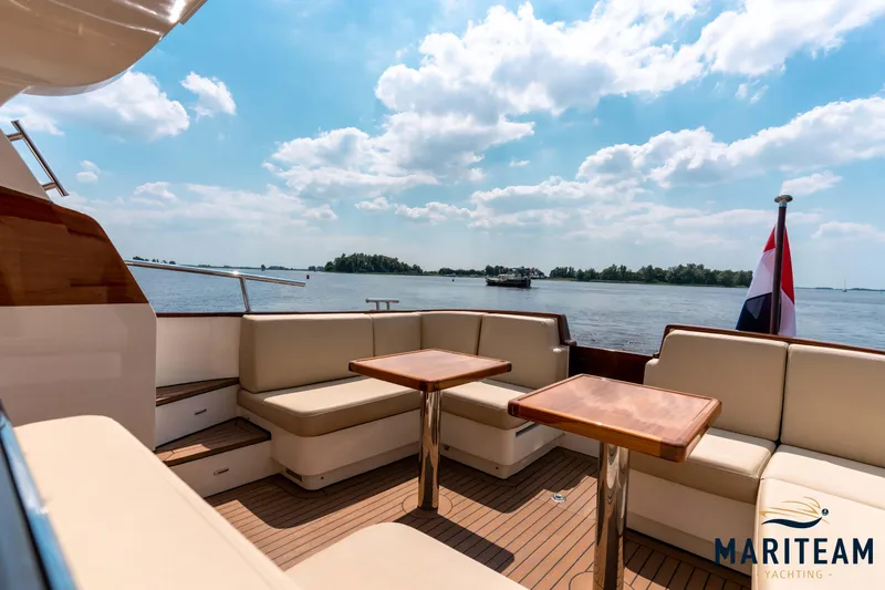 Onderonsie Yacht Photos Pics Luxurious 2017 Breedendam MTB fourzero Wheelhouse yacht with elegant seating and scenic water view.