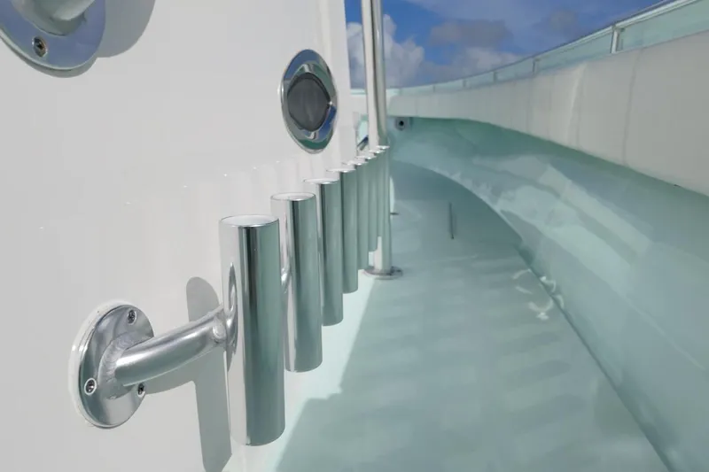  Yacht Photos Pics 2025 Contender 39 ST boat with sleek rod holders and modern design.