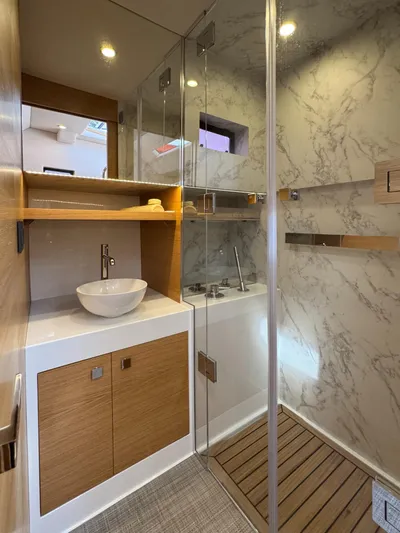  Yacht Photos Pics Luxurious bathroom in 2025 De Antonio Yachts D50, featuring modern fixtures and elegant design.