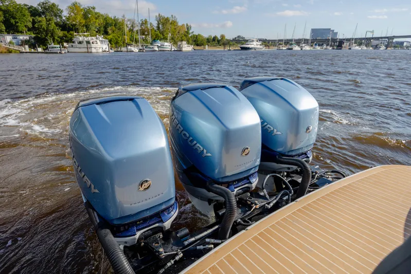  Yacht Photos Pics 2018 Formula 350 Crossover Bowrider OB with triple Mercury outboard engines on a river.