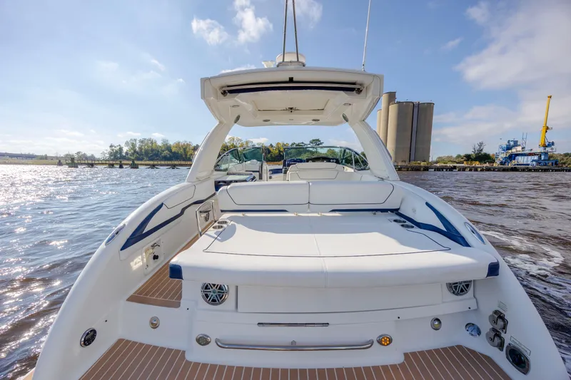  Yacht Photos Pics 2018 Formula 350 Crossover Bowrider OB on water, showcasing spacious deck and seating.