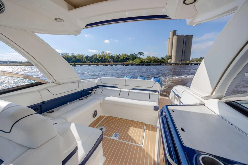  Yacht Photos Pics 2018 Formula 350 Crossover Bowrider OB on water, spacious deck, scenic view.
