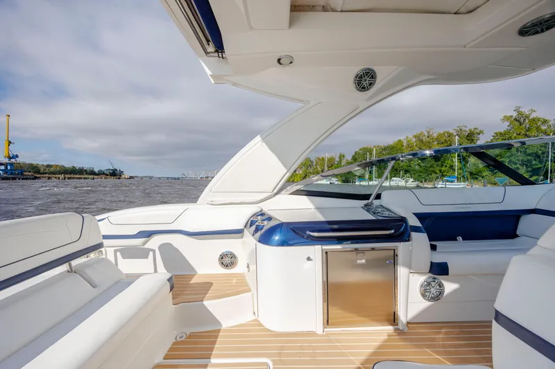  Yacht Photos Pics 2018 Formula 350 Crossover Bowrider OB interior with sleek design and waterfront view.