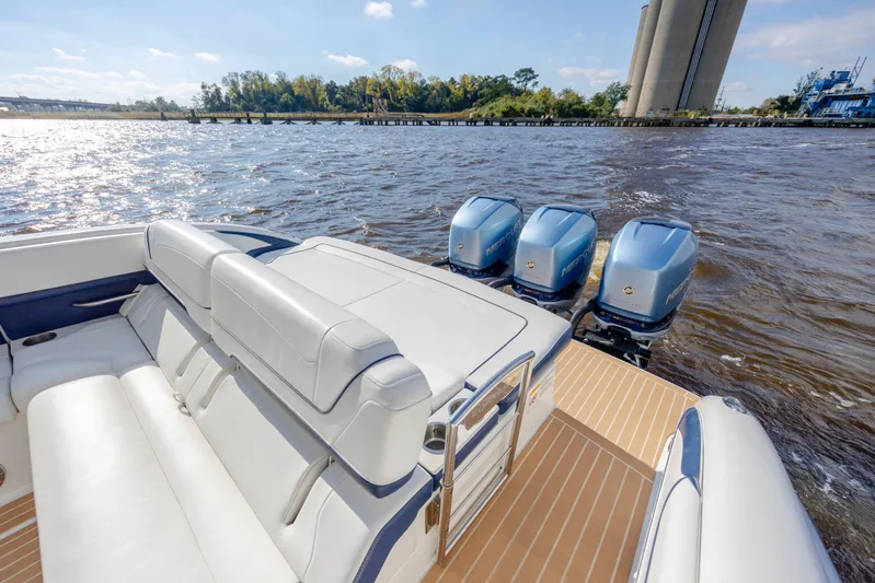  Yacht Photos Pics 2018 Formula 350 Crossover Bowrider OB with triple Mercury outboard engines on a sunny day.