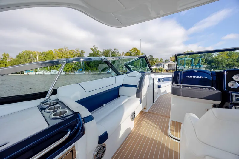  Yacht Photos Pics 2018 Formula 350 Crossover Bowrider OB interior with luxurious seating and sleek design.