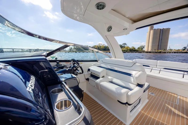  Yacht Photos Pics 2018 Formula 350 Crossover Bowrider OB interior with luxurious seating and water view.
