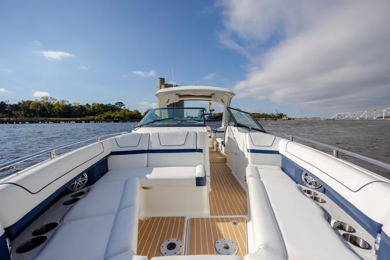  Yacht Photos Pics 2018 Formula 350 Crossover Bowrider OB on water, featuring spacious seating and sleek design.