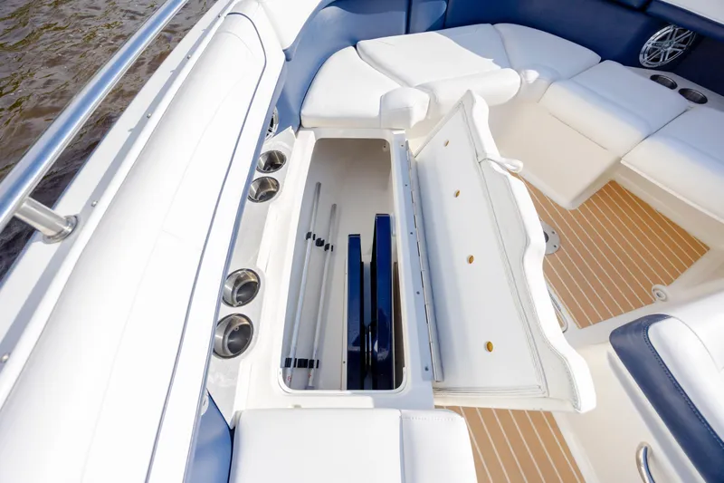  Yacht Photos Pics 2018 Formula 350 Crossover Bowrider OB interior with open storage compartment.