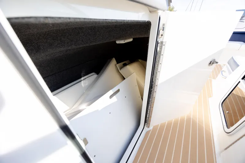  Yacht Photos Pics Storage compartment in 2018 Formula 350 Crossover Bowrider OB boat, open door view.