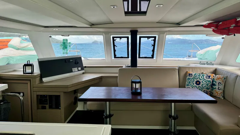  Yacht Photos Pics Interior of 2019 Fountaine Pajot Lucia 40 catamaran with ocean view through windows.