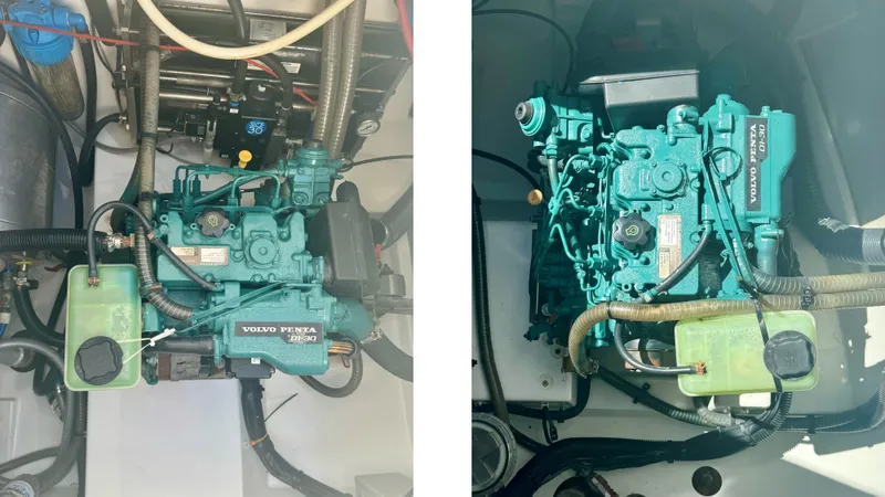  Yacht Photos Pics Engine compartment of a 2019 Fountaine Pajot Lucia 40 catamaran, showcasing mechanical components.