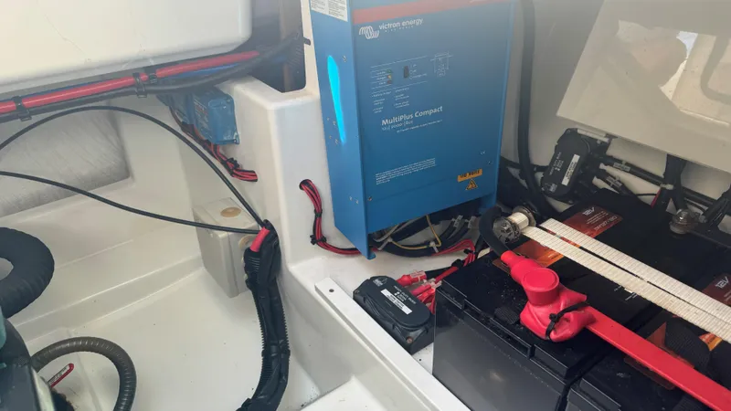  Yacht Photos Pics Electrical system of a 2019 Fountaine Pajot Lucia 40 catamaran, featuring batteries and wiring.