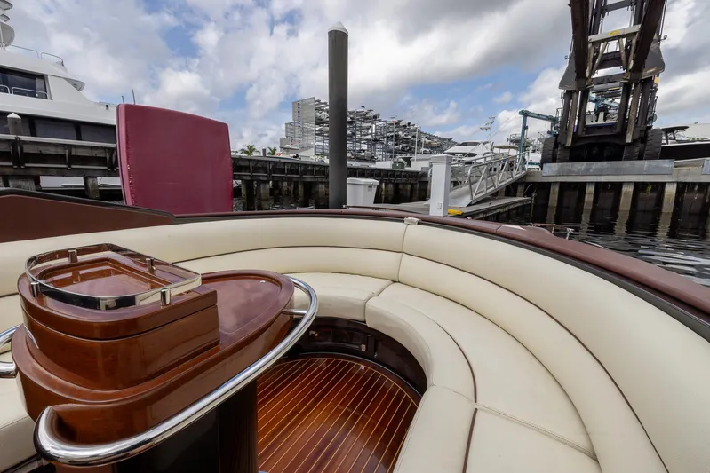  Yacht Photos Pics Luxurious 2013 Riva Aquariva Super yacht interior with elegant seating and wooden accents.