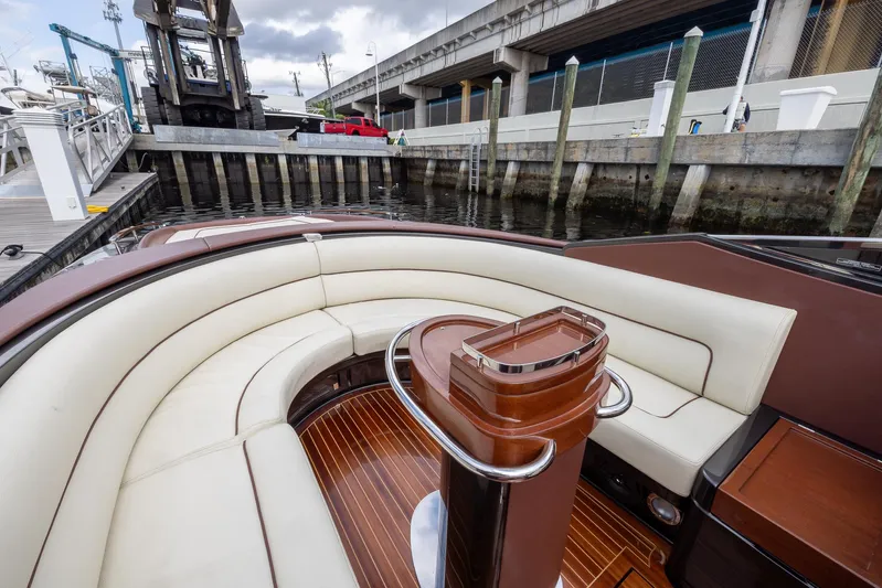 Yacht Photos Pics Luxurious 2013 Riva Aquariva Super boat interior with elegant seating and wood accents.