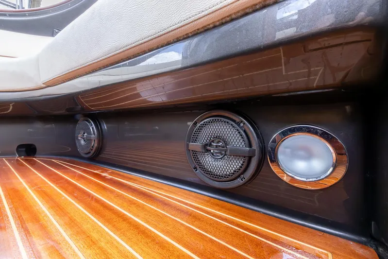  Yacht Photos Pics 2013 Riva Aquariva Super interior with wooden flooring and built-in speakers.