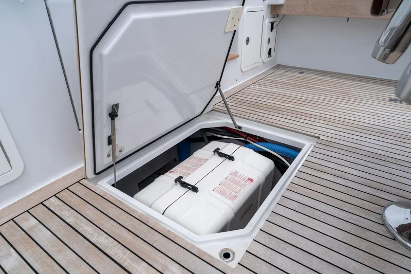 How Bout It Yacht Photos Pics 2017 Custom Carolina 43 Cinco Boatworks Express storage compartment with equipment on deck.