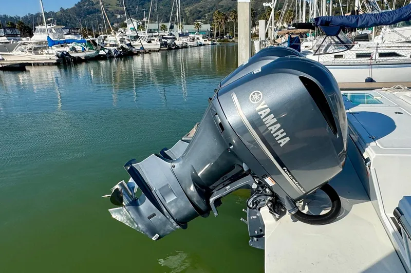  Yacht Photos Pics 2021 Parker 2820 XLD Sport Cabin with Yamaha outboard motor in marina setting.