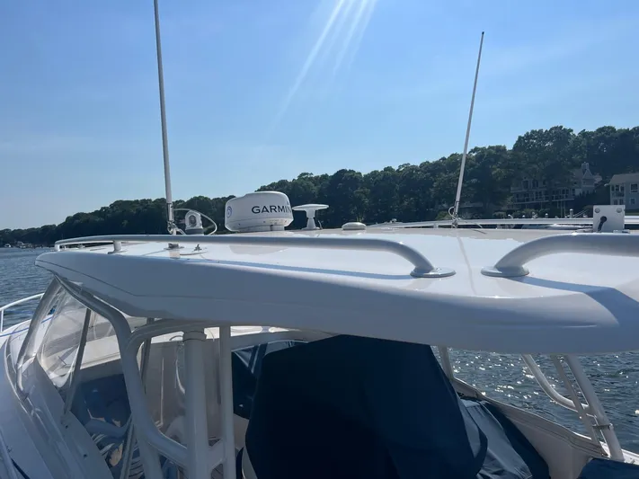  Yacht Photos Pics 2019 Intrepid 407 Cuddy boat with Garmin radar on a sunny day.