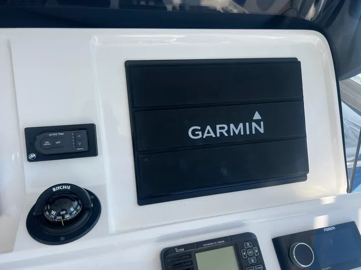  Yacht Photos Pics Garmin navigation system on 2019 Intrepid 407 Cuddy boat dashboard.