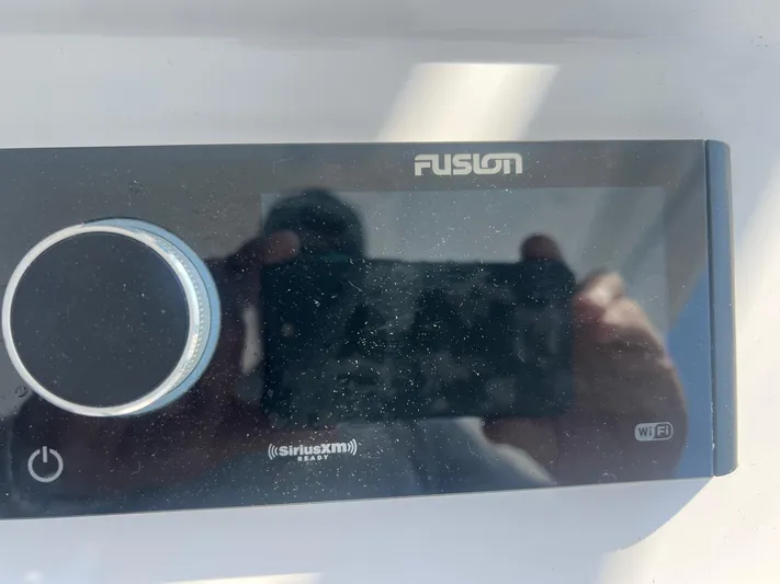  Yacht Photos Pics Fusion audio system in a 2019 Intrepid 407 Cuddy boat.