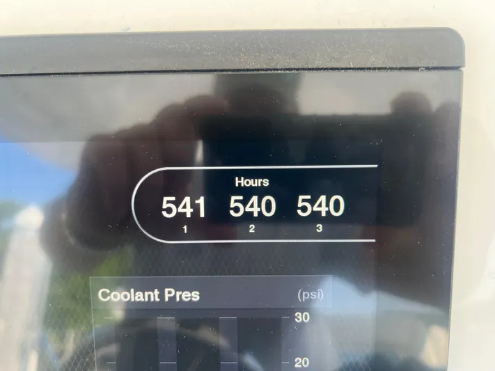  Yacht Photos Pics Digital display showing engine hours and coolant pressure on a 2019 Intrepid 407 Cuddy.
